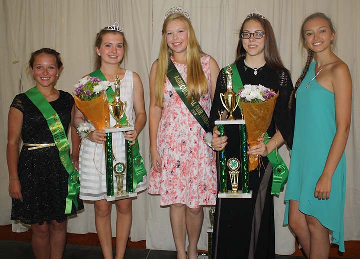 The 2015 Monmouth County 4-H Ambassadors Jillian Haliskoe of Middletown and McKayla Tyrrell of Freehold Township were crowned by the 2015 New Jersey Agricultural Fair Ambassador Kirsten Jeansson on opening night of the Monmouth County Fair on July 22 in Freehold, NJ. Pictured left to right: 2014 4-H Ambassador Erica Todd of Jackson, Jillian Haliskoe, Kirsten Jeansson, McKayla Tyrrell and 2014 4-H Ambassador Rebecca Carmeli-Peslak of Millstone.